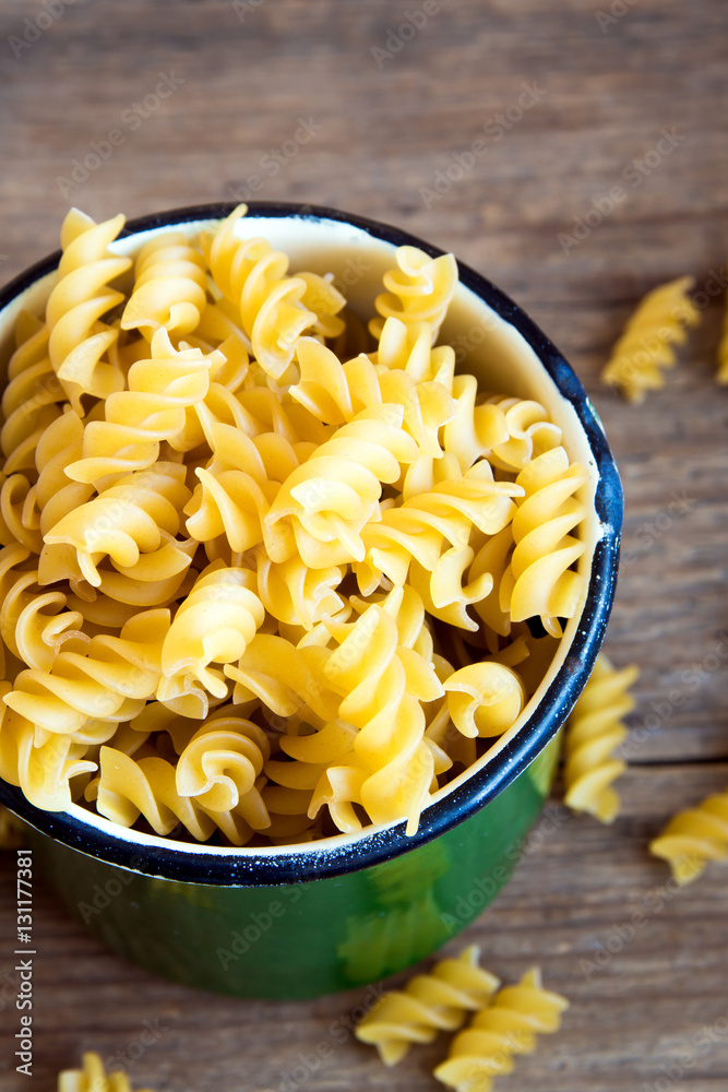 Poster uncooked fusilli pasta