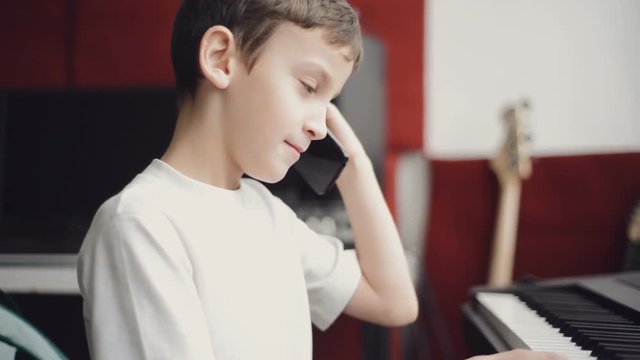 Little boy talking on a cell phone