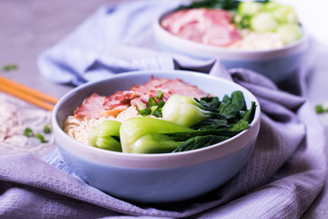 Instant noodles with shiitake mushrooms, pepper and onion in a b
