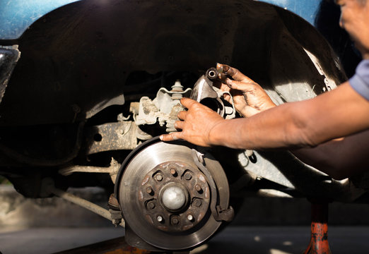 Mechanic finger dirty with oil grease for lubricant car disk bre