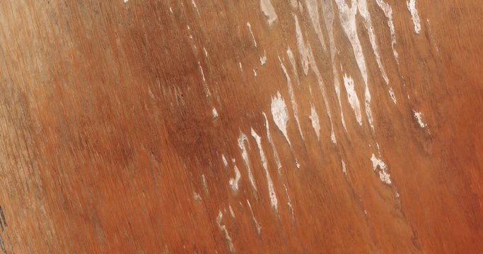 High-altitude overflight aerial of rock formations in the Simpson Desert, Australia. Clip loops and is reversible. Elements of this image furnished by USGS/NASA Landsat