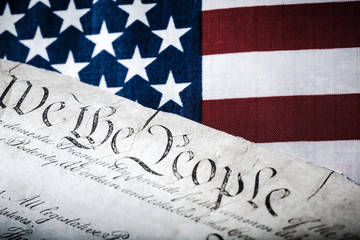 The American Constitution on a flag background