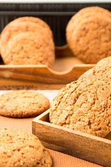 Group of oatmeal cookies on a wooden tray