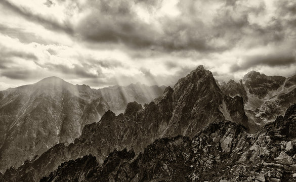 Fototapeta Peak in High tatras mountains. Dark cloudscape