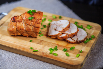 chicken roll on a board, pastrami meat, sausage house