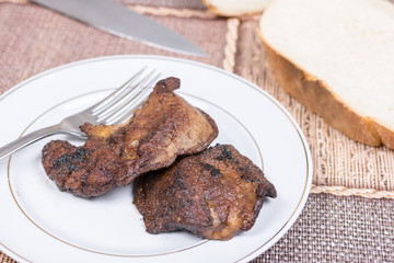 Fried pork liver served on the plate