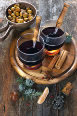 Winter drink: mulled wine with honey and roast chestnuts