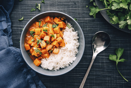 Bowl of sweet potato ragout served with rice