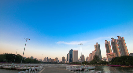 Fototapeta premium Bangkok cityscape twilight at benjakitti public park, Thailand.