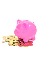 Concept image for financial planning. Creatively lit gold piggy bank a white background. Copy space.