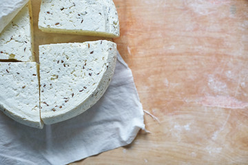 Heads of homemade farming cheese, eco-friendly organic food