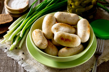 Homemade meat chicken sausage and a variety of pickled vegetable