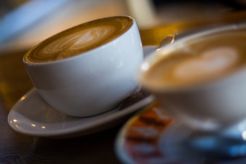 Two cups of cappuccino