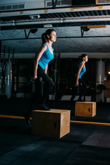 young sporty woman in gym