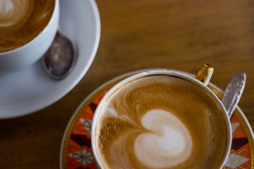 Two cups of cappuccino