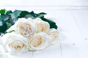 White roses and wood pigeon