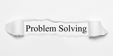 Problem Solving on white torn paper