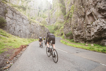 Three cylists attacking the climb in Cheddar Gorge, U.K