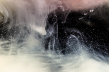 white smoke isolated on black background
