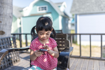 Little girl with smart phone