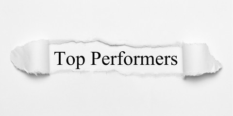Top Performers on white torn paper