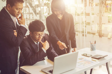 Team works. young businessmans crew working with new startup project in office. Film effected photo.