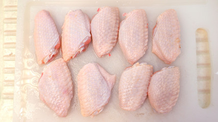 Chicken wings raw meat upside down all