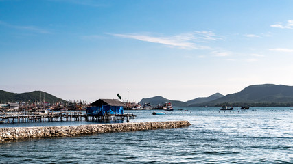 Old wooden fishing boats moored in Chonburi, Thailand