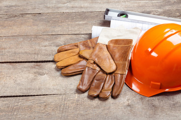 hardhat and old leather gloves
