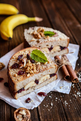 Banana toasts with walnut, cranberries and cinnamon