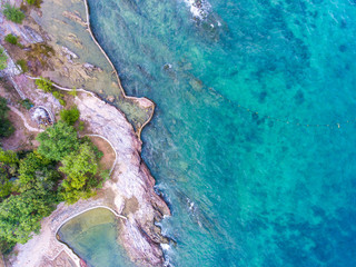 Aerial Shot of Sea and Breakwater, Top View.