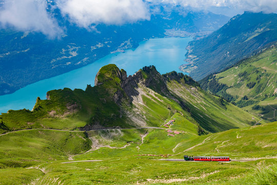 Train travelling through mountains, Brienzer Rothorn, Bernese Oberland, Switzerland