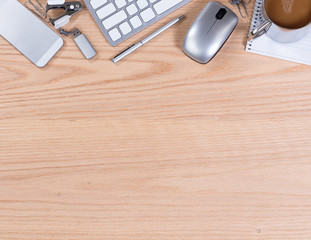 Wooden desktop with various office equipment 
