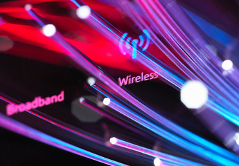  Fibre optics shooting past a broadband hub illustrating digital communications