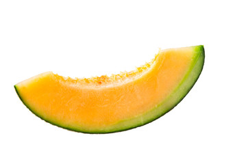 Fresh orange  japanese melons sliced on wooden table