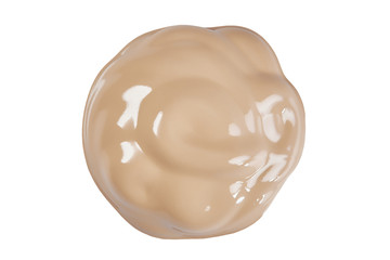 Round face make-up liquid foundation sample on a white background
