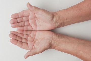 Wrinkled on old woman hand skin