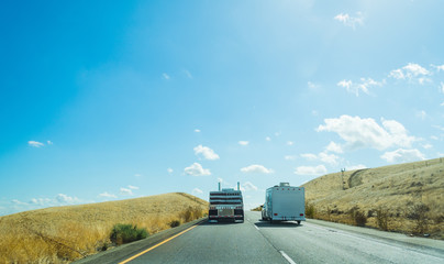 Truck overtaking a caravan in Interstate 5