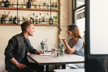 Young couple in cocktail bar