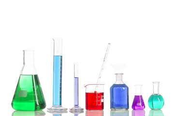 Various laboratory flasks with a colored reagents, pipette