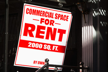 Close up of rental sign outside commercial building