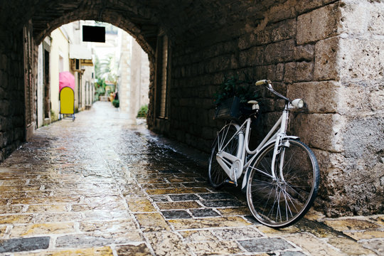 White vintage bicycle at old town in Budva, Montenegro © Ivan Kurmyshov