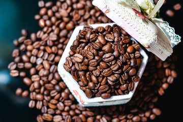 Roasted coffee beans on a black background