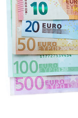 various euro notes on white background