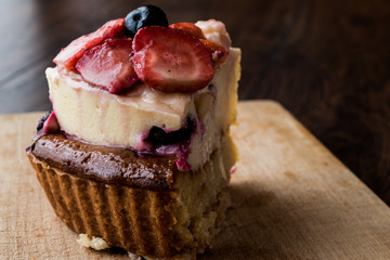 Fruit Tart Slice with strawberry and berries.