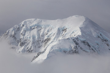 The highest peaks of Denali National Park from above. Denali previously known as McKinley Alaska.