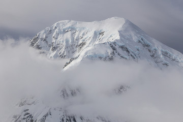 Fototapeta premium The highest peaks of Denali National Park from above. Denali previously known as McKinley Alaska.