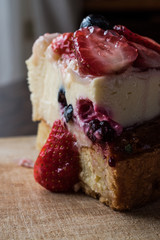 Fruit Tart Slice with strawberry and berries.