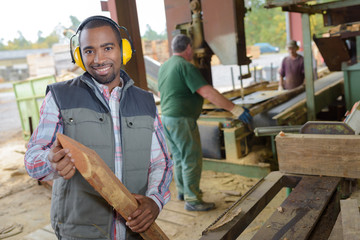 Man at work in sawmill