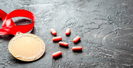 Concept of doping in sport - deprivation medals